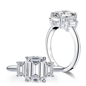 Stunning Emerald Trio Diamond Ring